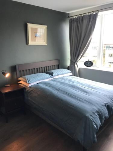 Postel nebo postele na pokoji v ubytování Beautiful Penthouse Apartment Dublin 18
