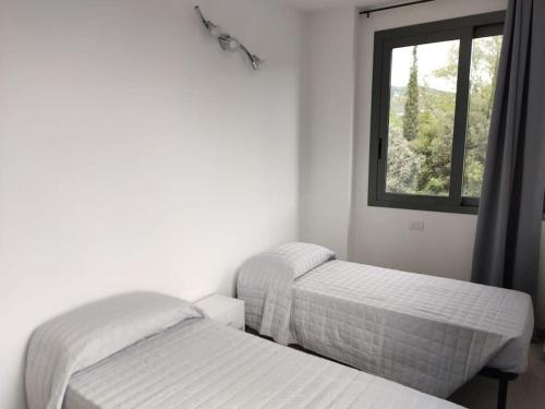 Postel nebo postele na pokoji v ubytování Casa ToNi