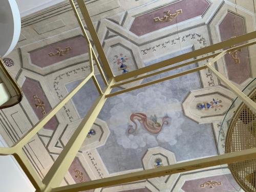 a ceiling of a building with a painting on it at Dream house, 80M2, Fresco painting on the vault in Marciana