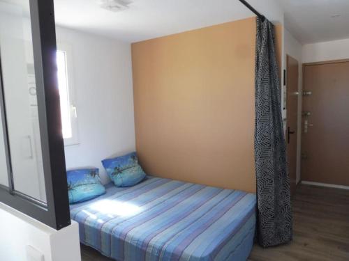 Posteľ alebo postele v izbe v ubytovaní Le petit coin de paradis.