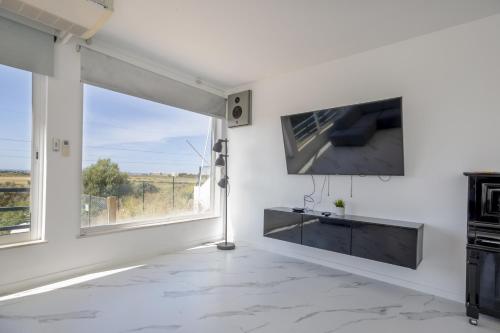 TV a/nebo společenská místnost v ubytování Villa Avalon by Algarve Vacation