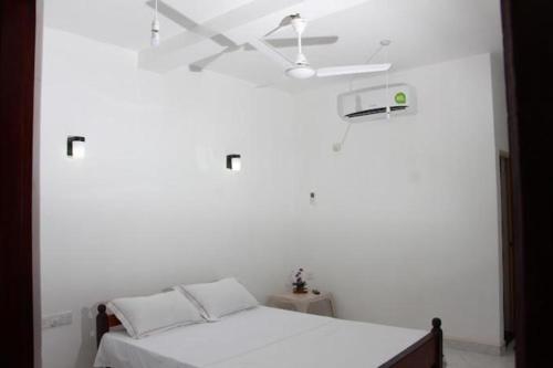 Ένα ή περισσότερα κρεβάτια σε δωμάτιο στο Tatyana House