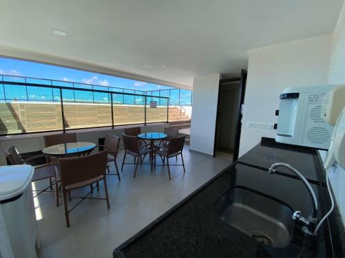 Kuchyň nebo kuchyňský kout v ubytování AP TÉRREO COM PISCINA PRIVATIVA