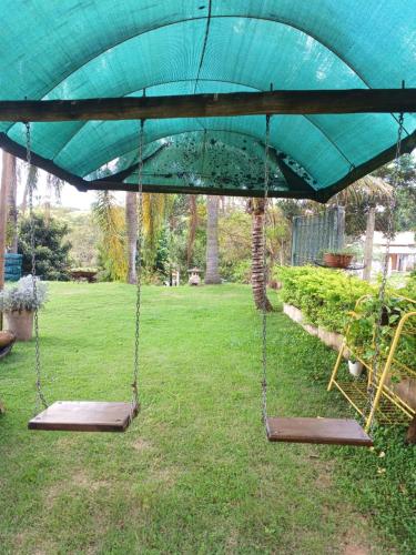 Taman di luar Casa Lot Fechado, Churrasqueira, Piscina, Toboágua, parque para crianças , Internet