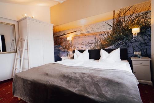 Postel nebo postele na pokoji v ubytování Hotel Villa Schwanebeck