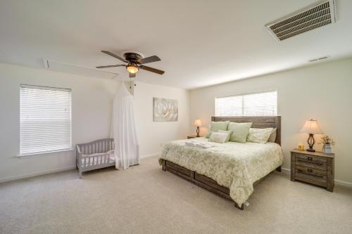 a bedroom with a bed and a ceiling fan at Mtn-View Ski Retreat with Grill in Seven Devils! in Seven Devils