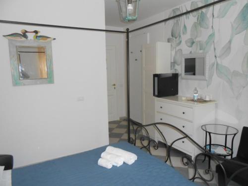Ένα ή περισσότερα κρεβάτια σε δωμάτιο στο Casale Grandangolo