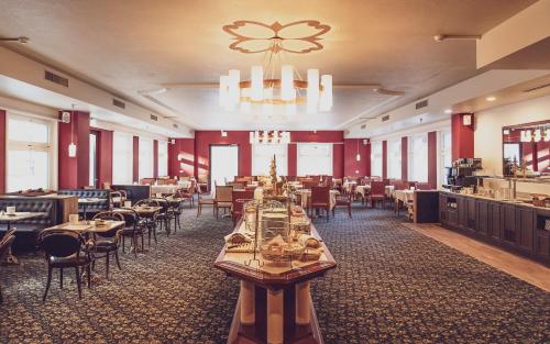 Restaurace v ubytování Hotel Strela by Mountain Hotels