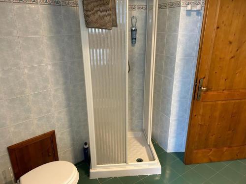 a bathroom with a shower and a toilet in it at La Casa di Laura in Cortona