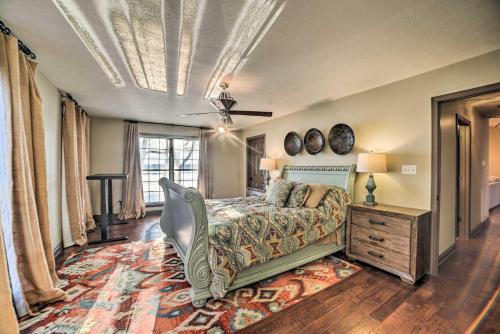 a bedroom with a bed with a whale headboard at Peaceful Big Sandy Home with Deck on Kentucky Lake! in Big Sandy