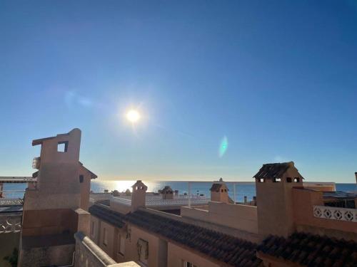 a view of the ocean from the roof of a building at Apartament La Mata Torrevieja in Torrevieja
