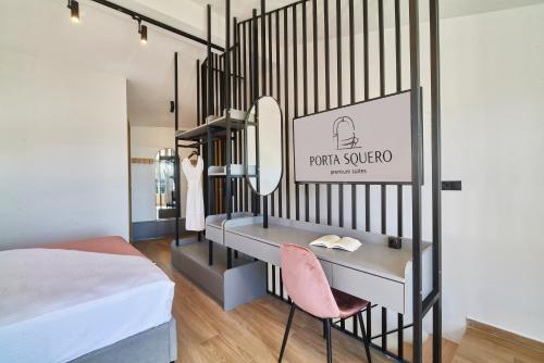 Katil atau katil-katil dalam bilik di PORTA SQUERO Premium Suites
