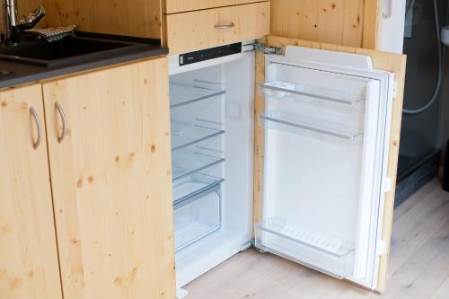 Кухня или мини-кухня в Tiny House Nature 13 Zur Kuhweide - Green Tiny Village Harlesiel
