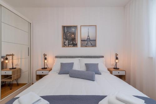 Ένα ή περισσότερα κρεβάτια σε δωμάτιο στο Infinity Residence