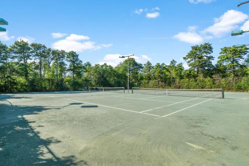 a tennis court with a net on it at Nantucket Inn in Nantucket