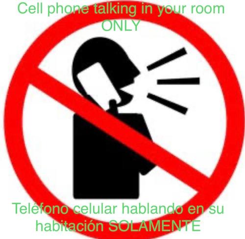 a no cell phone talking in your room only sign at Casa Xochitl in La Paz