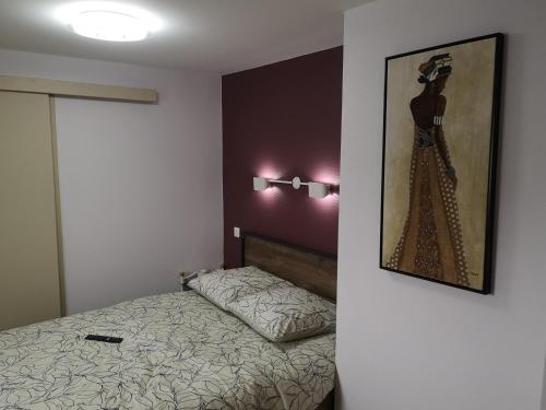 En eller flere senge i et værelse på L'auberge des quatre routes