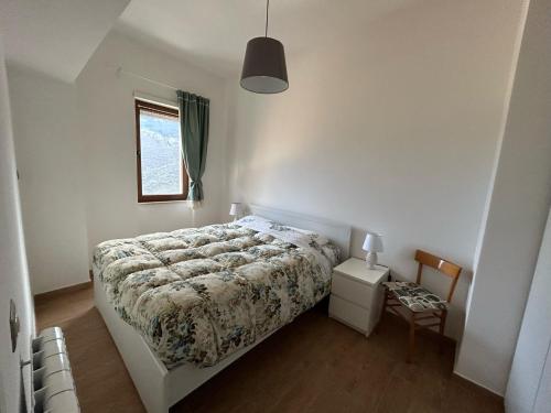 Ліжко або ліжка в номері Appartamento Cuore D’Abruzzo