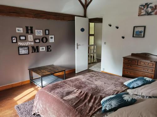 Кровать или кровати в номере chambres d hotes L'agapé
