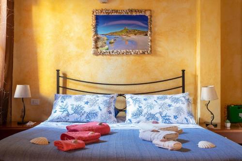 Una cama o camas en una habitación de Affittacamere Shardana
