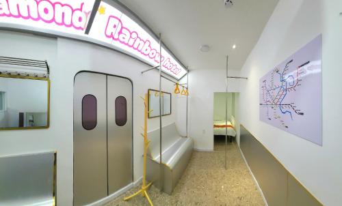 a room with a hallway with a subway train at Language Exchange Hotel 3 in Ho Chi Minh City