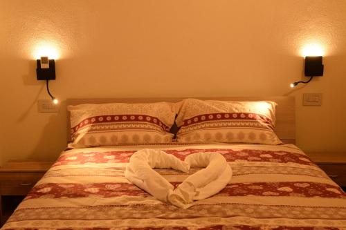เตียงในห้องที่ B&B Da Nora