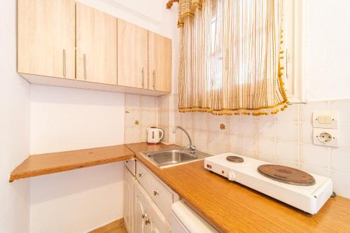 Kuchyň nebo kuchyňský kout v ubytování Arianna Studio Ground Floor 1