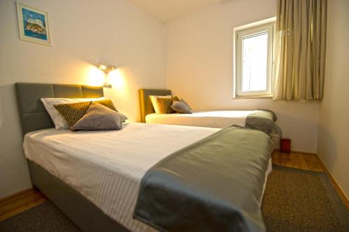 Apartment Duby tesisinde bir odada yatak veya yataklar