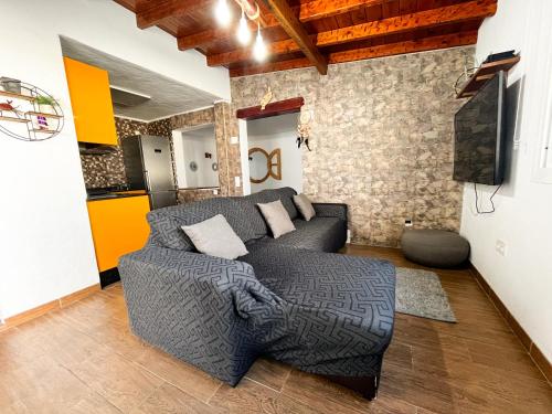 Televízia a/alebo spoločenská miestnosť v ubytovaní CASA DOMINGO 1