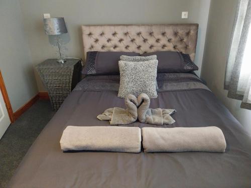 Кровать или кровати в номере 3-Bed Apartment in Lowestoft with sea views