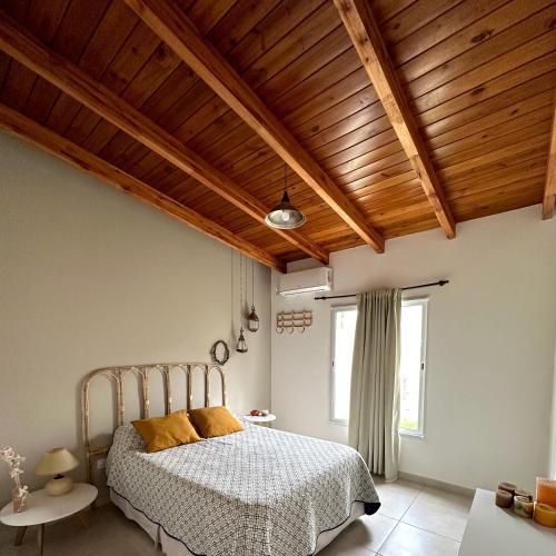 Ένα ή περισσότερα κρεβάτια σε δωμάτιο στο Quinta El Hornero