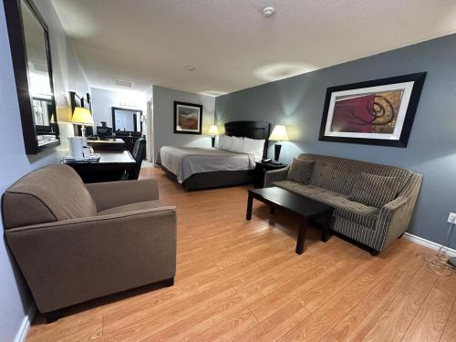 Katil atau katil-katil dalam bilik di Kenora Motel