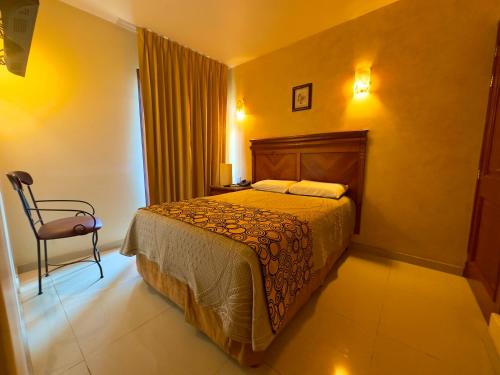 Cama o camas de una habitación en Quinta Roca Hotel