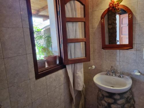 a bathroom with a sink and a mirror at Cardones de Molinos in Molinos