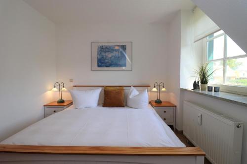 Ένα ή περισσότερα κρεβάτια σε δωμάτιο στο Alter Krug App 11