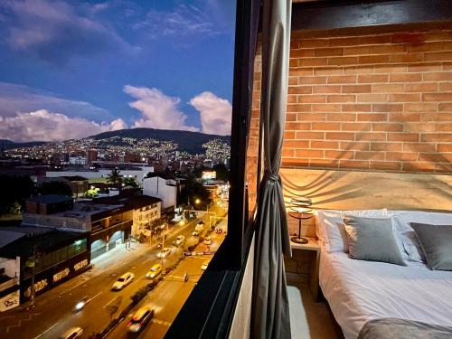 Postel nebo postele na pokoji v ubytování Apartamento en Laurels Medellín