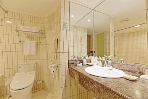 Koupelna v ubytování Santos Hotel