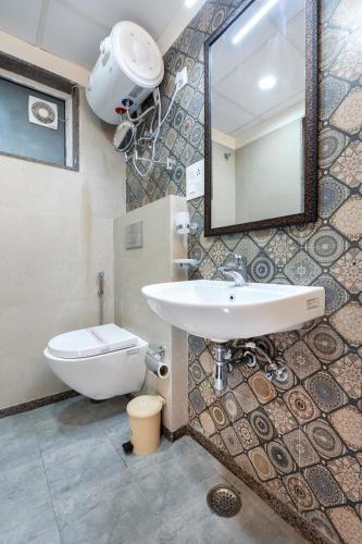Ένα μπάνιο στο Palm Stay - Studios & Rooms