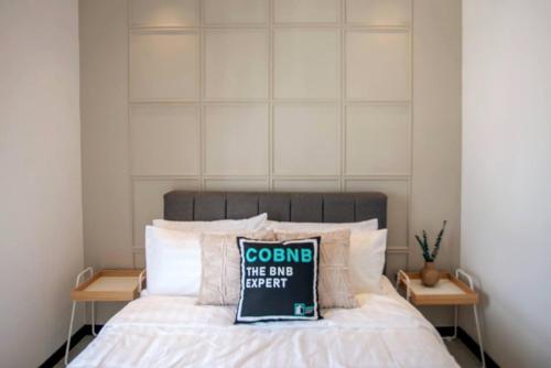 Katil atau katil-katil dalam bilik di Neu Suites by COBNB