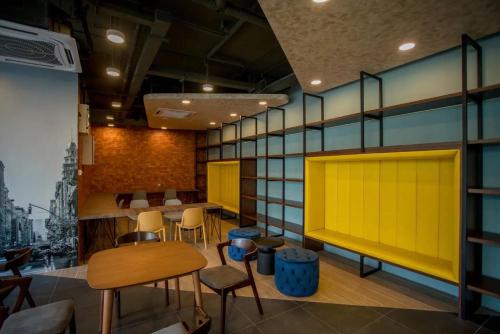 Posezení v ubytování Neu Suites by COBNB