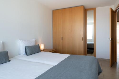 Katil atau katil-katil dalam bilik di Strandappartementen De Gulden Stroom