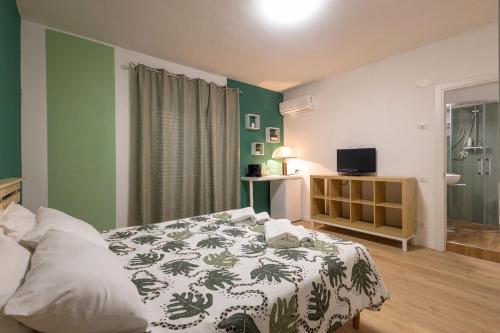 Postel nebo postele na pokoji v ubytování Una Terrazza nel Sole a Trapani