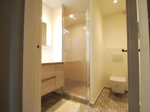 a bathroom with a shower and a toilet at Dalí in Begur