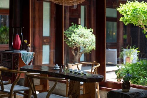 Un jardín fuera de Jun Bo Xuan Boutique Hotel