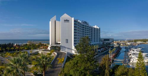 a large white building with a marina and a harbor at Tivoli Marina Vilamoura in Vilamoura