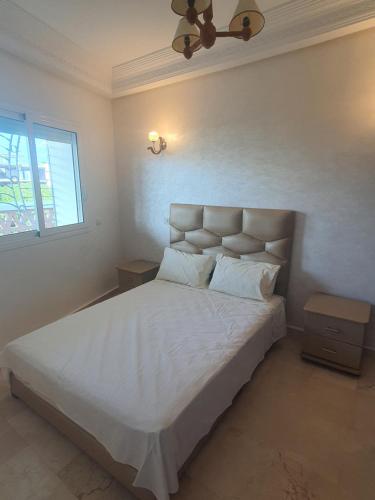 Ένα ή περισσότερα κρεβάτια σε δωμάτιο στο Passadena Village, Sidi Rahal