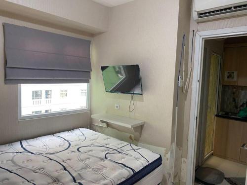 Dua Biji Guest House @Apt. Green Pramuka @2BR – Tower Faggio