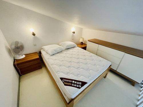 Posteľ alebo postele v izbe v ubytovaní Appartement spacieux à Cap d'Agde, proche port, commodités et plage, parking inclus - FR-1-723-10