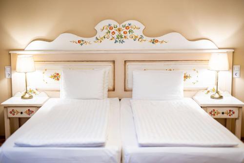 Кровать или кровати в номере Wolkendorf Bio Hotel & Spa
