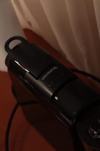 a close up of a cell phone sitting on a table at Dream apartments limnionas in Limniónas